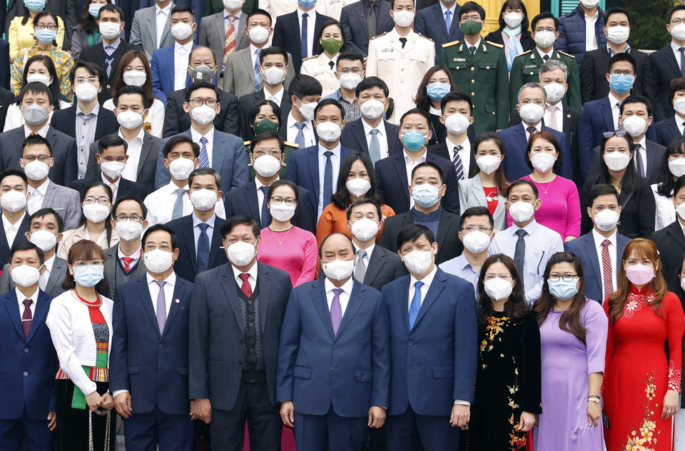 Chủ tịch nước Nguyễn Xuân Phúc và các đại biểu. (Ảnh: Thống Nhất/TTXVN)