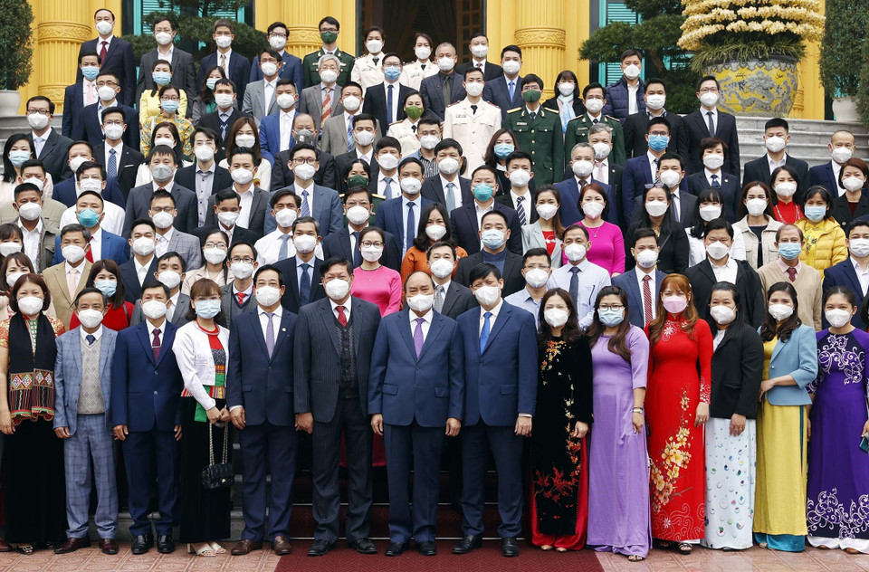 Chủ tịch nước Nguyễn Xuân Phúc và các đại biểu. (Ảnh: Thống Nhất/TTXVN)