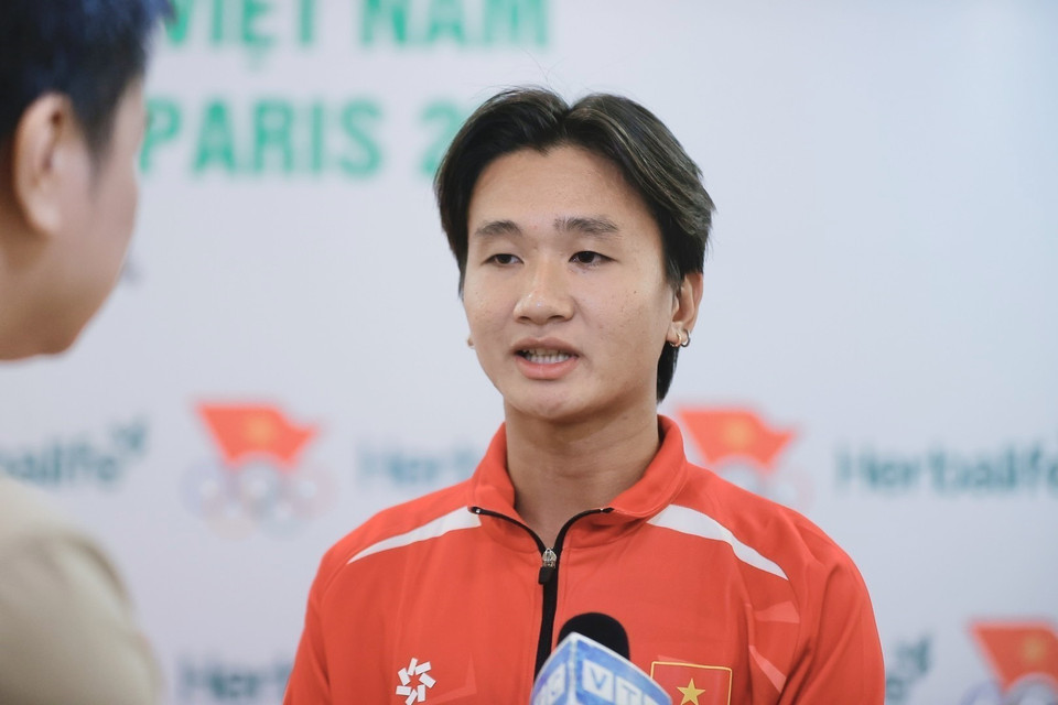 Vận động viên điền kinh Trần Thị Nhi Yến tại lễ xuất quân. (Ảnh: Minh Quyết/TTXVN)