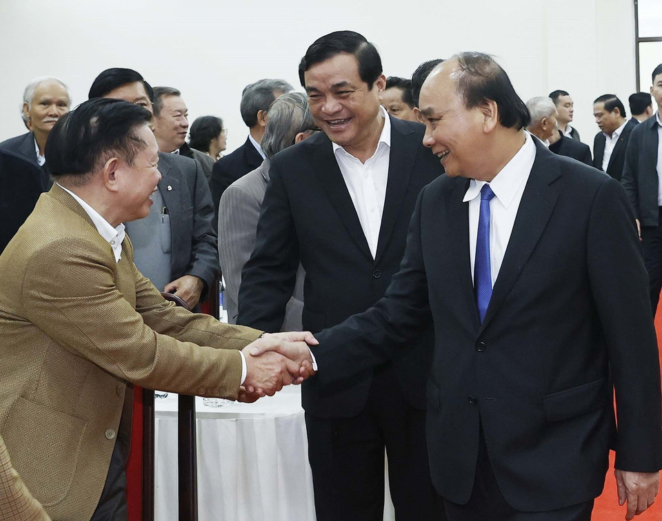 Chủ tịch nước Nguyễn Xuân Phúc và các đại biểu. (Ảnh: Thống Nhất/TTXVN)