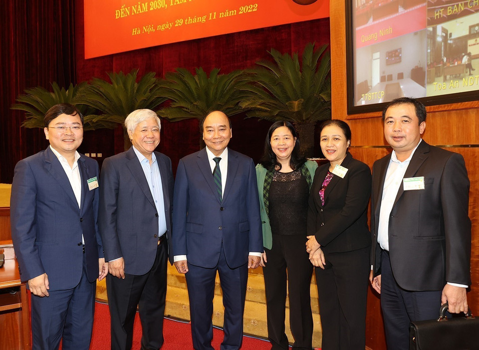 Chủ tịch nước Nguyễn Xuân Phúc với các đại biểu dự hội nghị. (Ảnh: Trí Dũng/TTXVN)