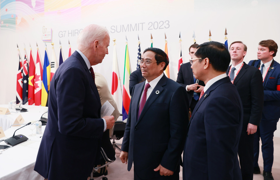 Thủ tướng Phạm Minh Chính và Tổng thống Hoa Kỳ Joe Biden tại phiên thảo luận. (Ảnh: Dương Giang/TTXVN)