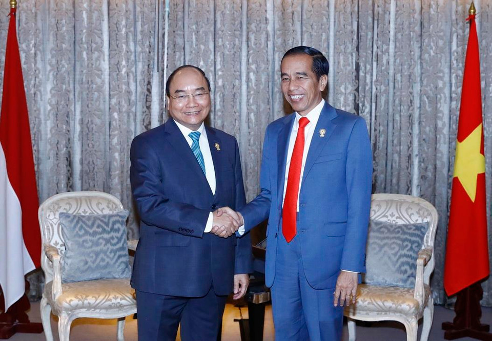 Thủ tướng Nguyễn Xuân Phúc hội kiến Tổng thống Indonesia Joko Widodo. (Ảnh: Thống Nhất/TTXVN)