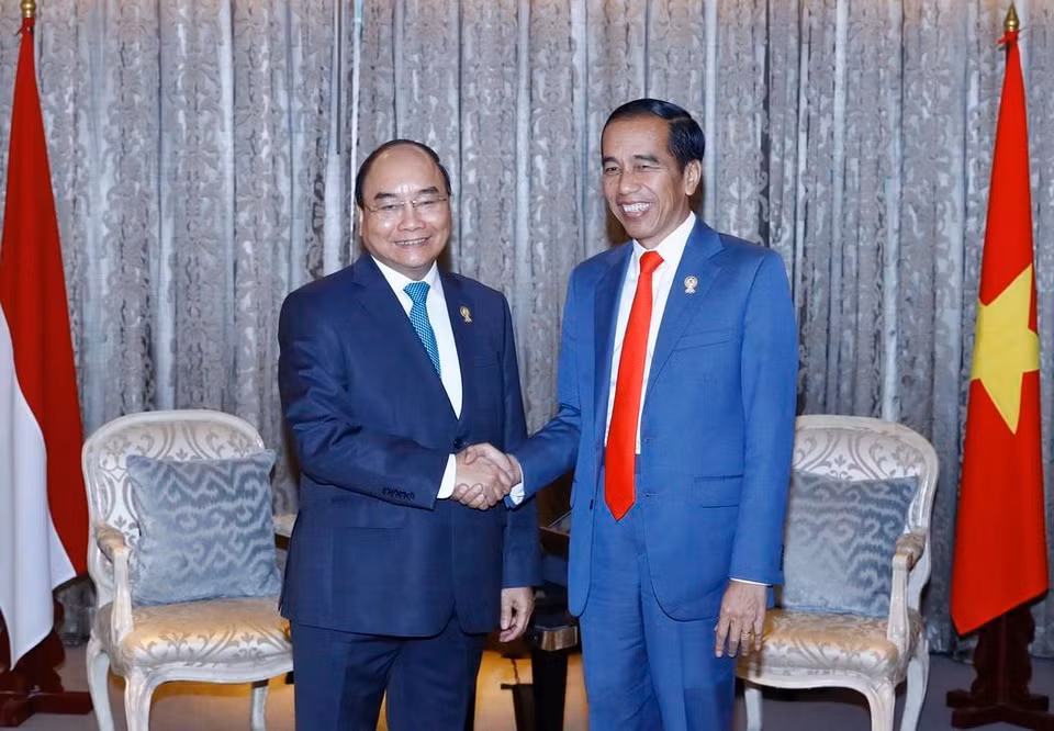 Thủ tướng Nguyễn Xuân Phúc hội kiến Tổng thống Indonesia Joko Widodo. (Ảnh: Thống Nhất/TTXVN)