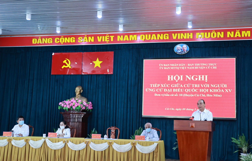 Chủ tịch nước Nguyễn Xuân Phúc trình bày chương trình hành động tại buổi tiếp xúc cử tri huyện Củ Chi ngày 9/5. (Ảnh: Thống Nhất/TTXVN)