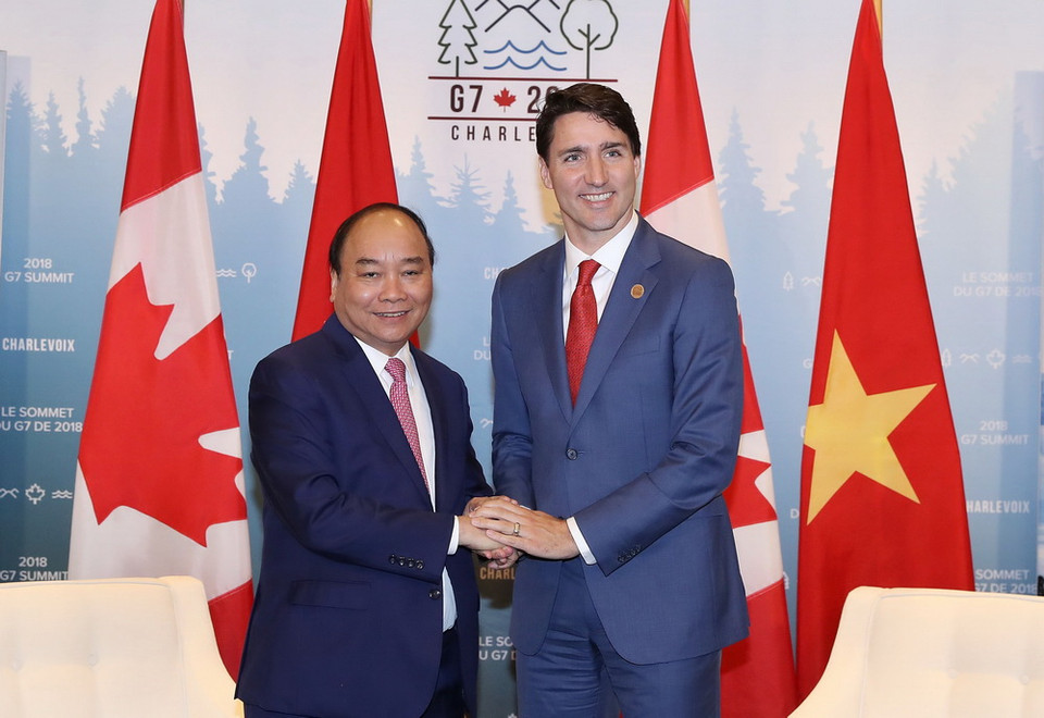Thủ tướng Nguyễn Xuân Phúc và Thủ tướng Canada Justin Trudeau hội đàm hẹp. (Ảnh: Thống Nhất/TTXVN)