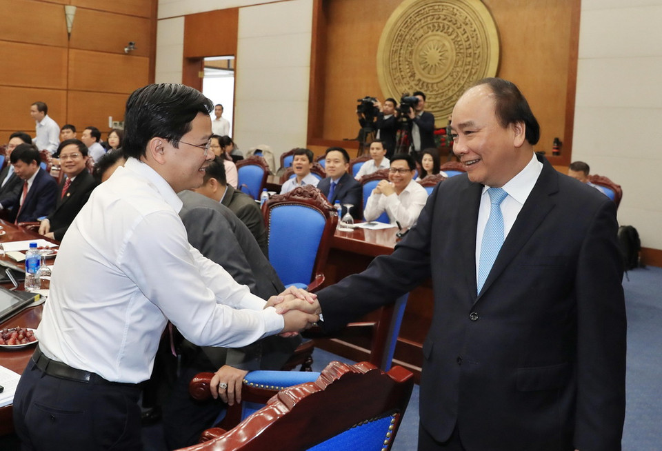 Thủ tướng Nguyễn Xuân Phúc và các đại biểu tham dự buổi làm việc. (Ảnh: Thống Nhất/TTXVN)