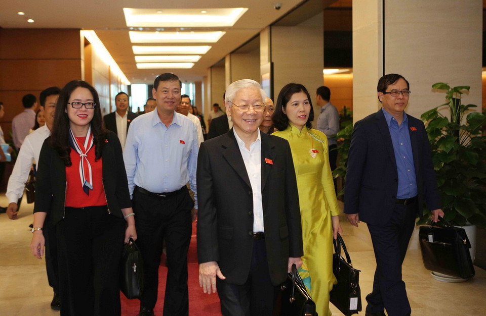 Tổng Bí thư Nguyễn Phú Trọng và các đại biểu đến dự phiên họp. (Ảnh: TTXVN)