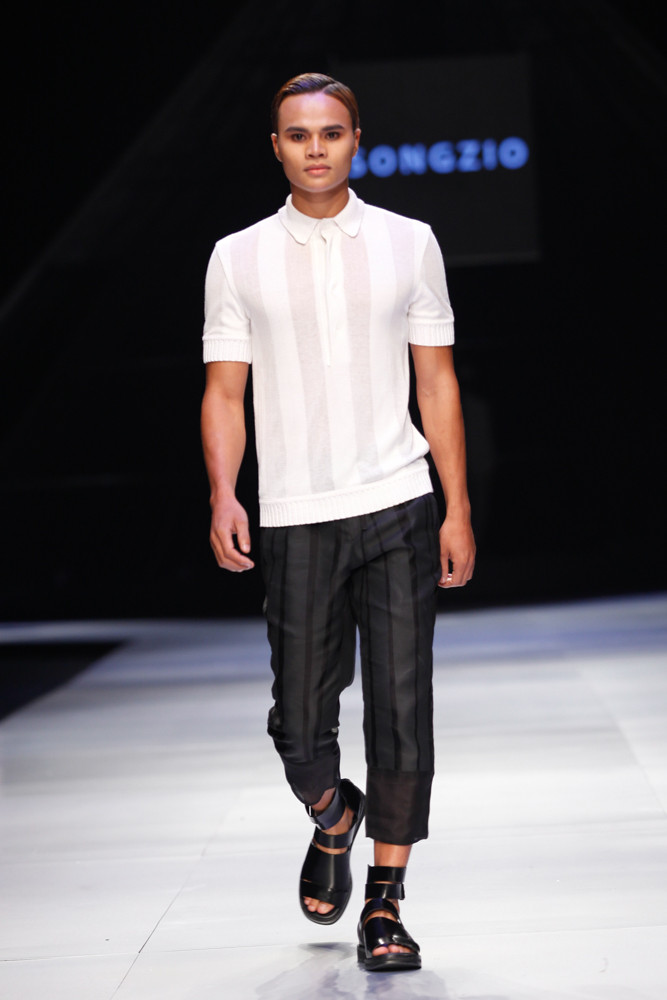 Sơ mi vải cổ tròn kết hợp quần ngắn và áo khoác là kiểu trang phục chủ đạo của cả BST. (Ảnh: BTC)