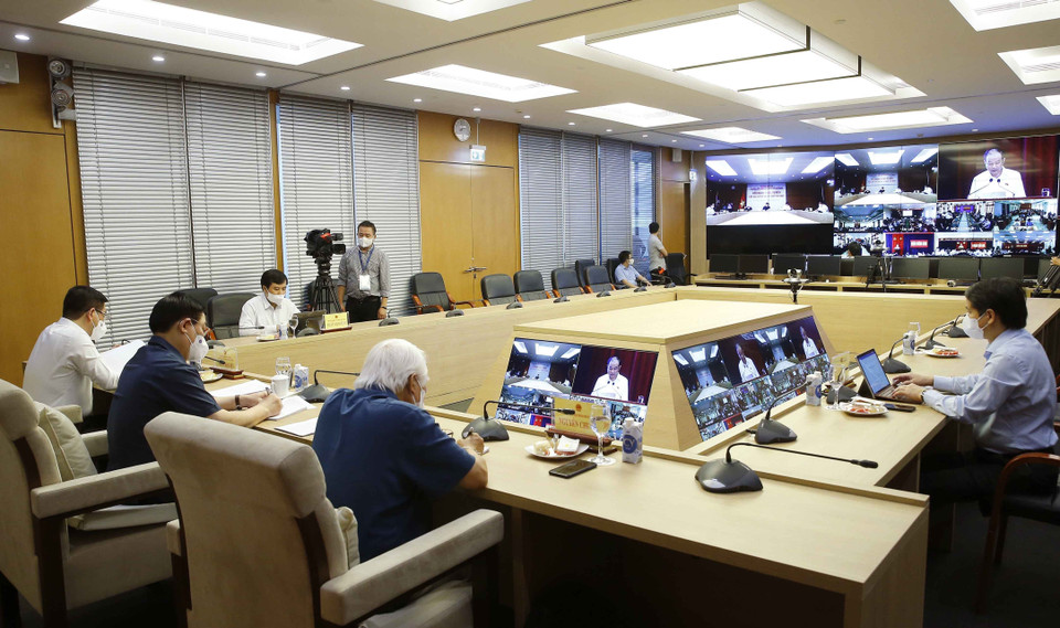 Chủ tịch Quốc hội Vương Đình Huệ và đại biểu dự Hội nghị trực tuyến. (Ảnh: Doãn Tấn/TTXVN)