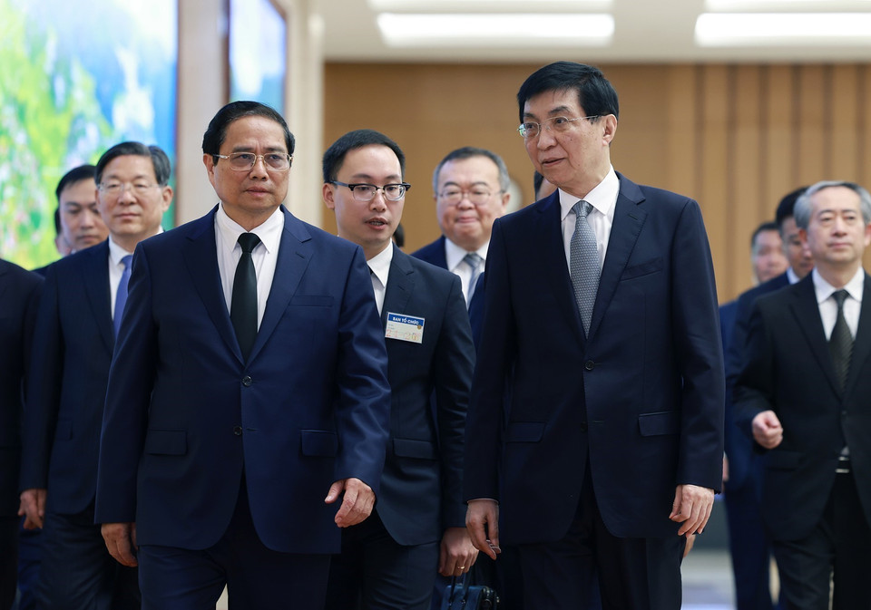 Thủ tướng Phạm Minh Chính tiếp Chủ tịch Chính hiệp Trung Quốc Vương Hộ Ninh. (Ảnh: Dương Giang/TTXVN)