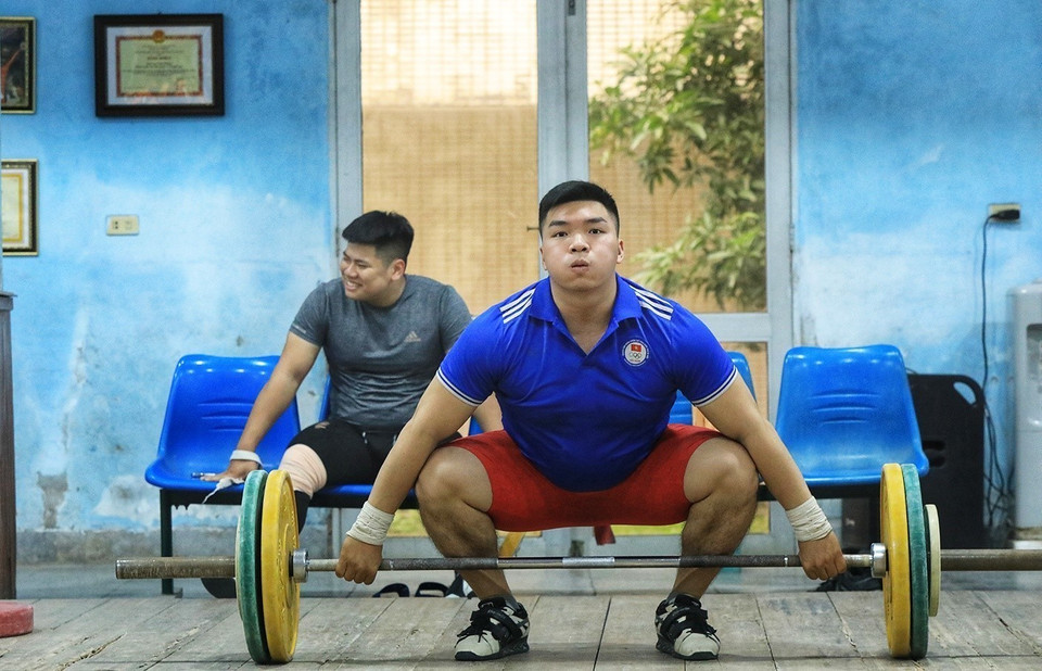 Vận động viên Trần Đình Thắng trong buổi tập luyện tại Trung tâm huấn luyện Thể thao Quốc gia Hà Nội. (Ảnh: Tuấn Anh/TTXVN)