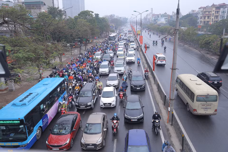 Chiều về Hà Nội ở cửa ngõ phía Nam chiều 16/2 không đông đúc, ken đặc phương tiện như mọi năm. (Ảnh: Hoàng Hiếu/TTXVN)