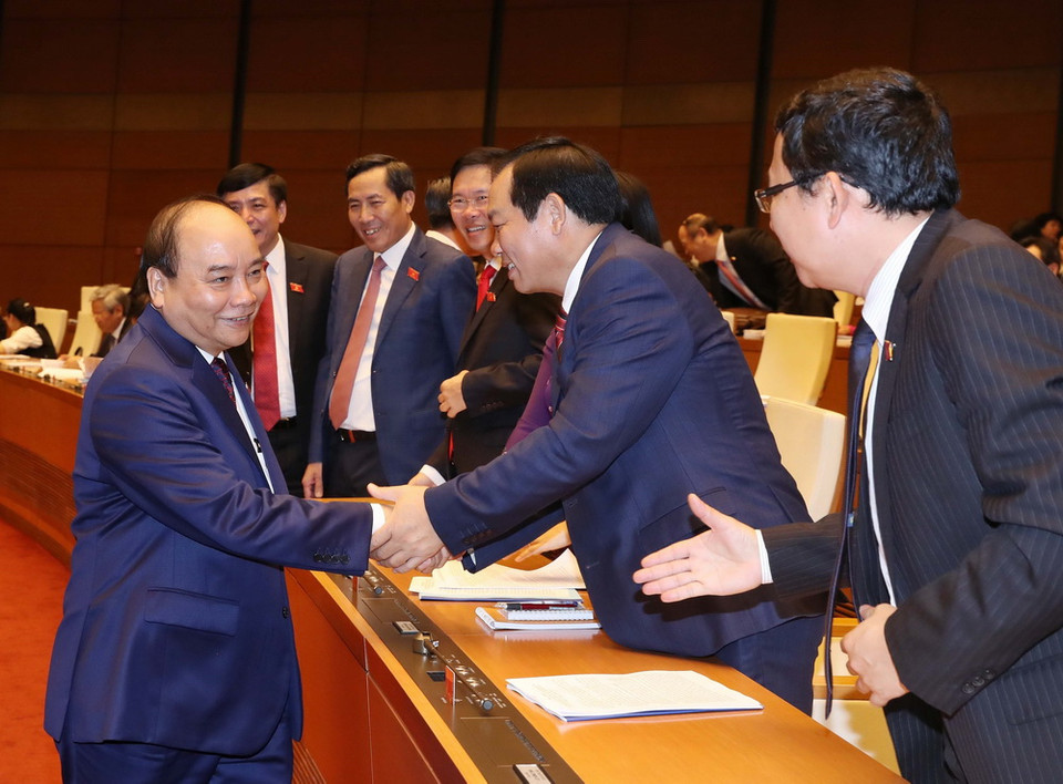 Thủ tướng Nguyễn Xuân Phúc và các đại biểu Quốc hội. (Ảnh: Thống Nhất/TTXVN)