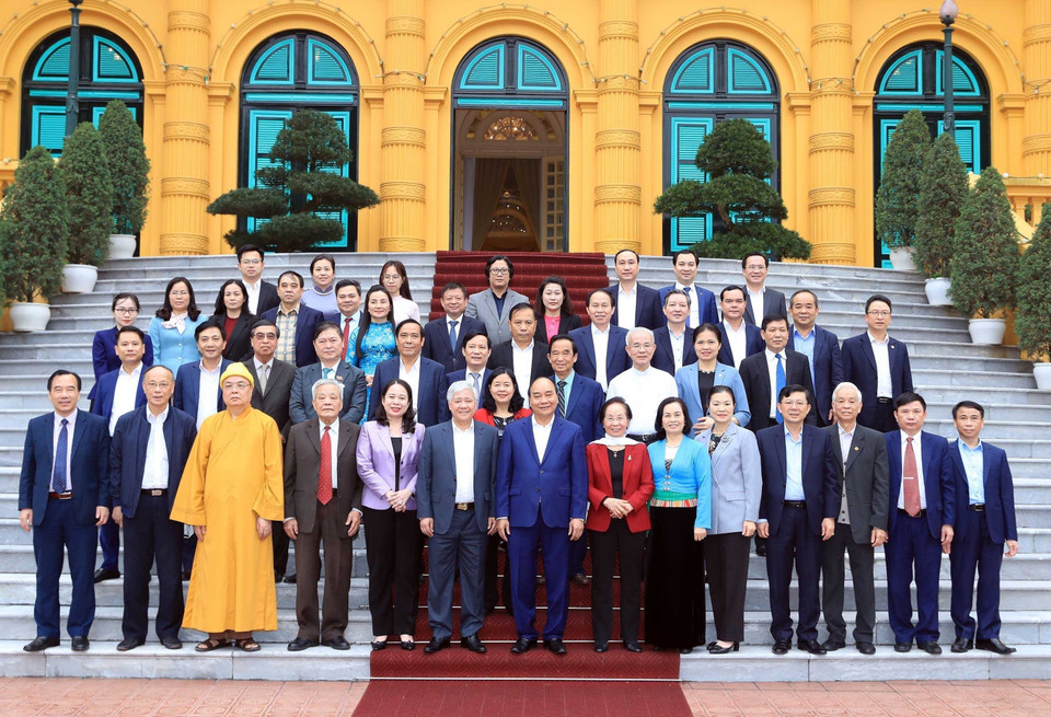 Chủ tịch nước Nguyễn Xuân Phúc với các đại biểu. (Ảnh: Thống Nhất/TTXVN)