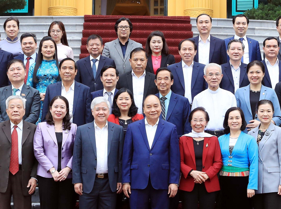 Chủ tịch nước Nguyễn Xuân Phúc với các đại biểu. (Ảnh: Thống Nhất/TTXVN)