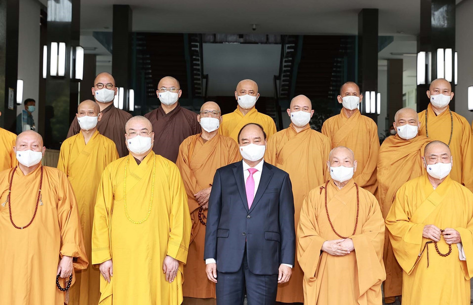 Chủ tịch nước Nguyễn Xuân Phúc với các đại biểu tại buổi tiếp. (Ảnh: Thống Nhất/TTXVN)