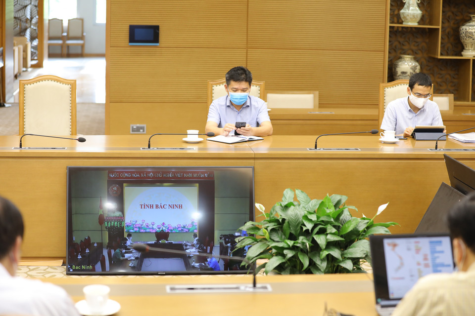 Quang cảnh cuộc họp trực tuyến với tỉnh Bắc Ninh và Bắc Giang. (Ảnh: Nguyễn Điệp/TTXVN)