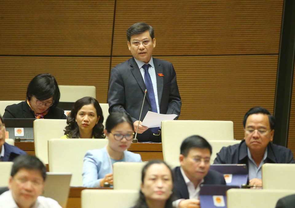 Viện trưởng Viện Kiểm sát Nhân dân Tối cao Lê Minh Trí trả lời câu hỏi chất vấn. (Ảnh: Doãn Tấn/TTXVN)