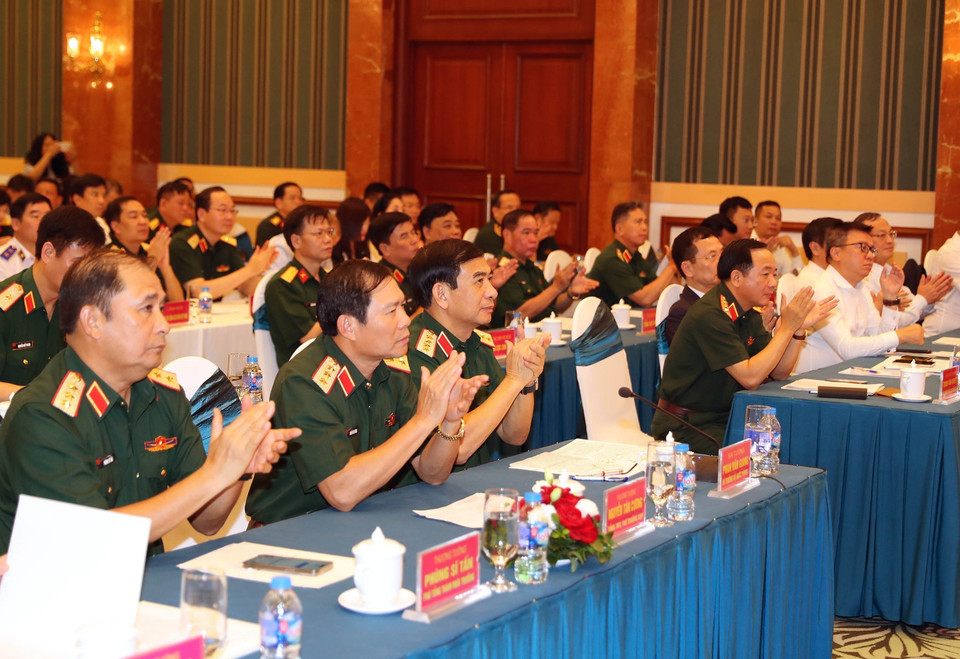 Đại tướng Phan Văn Giang và các đại biểu dự buổi gặp mặt. (Ảnh: Trọng Đức/TTXVN)