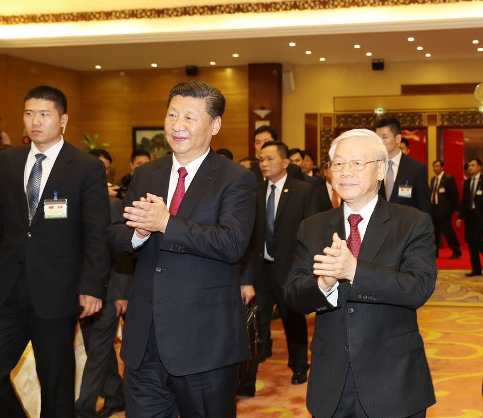 Tổng Bí thư Nguyễn Phú Trọng và Tổng Bí thư, Chủ tịch Trung Quốc Tập Cận Bình đến dự chiêu đãi. (Ảnh: Trí Dũng/TTXVN)