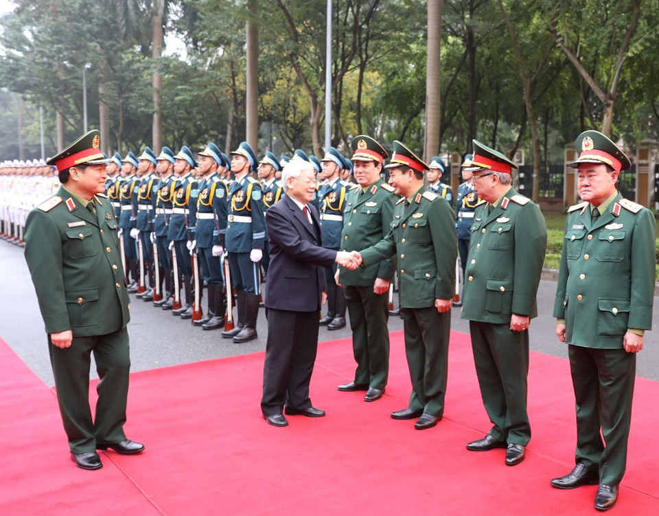  Tổng Bí thư, Chủ tịch nước Nguyễn Phú Trọng, Bí thư Quân ủy Trung ương với các lãnh đạo Bộ Quốc phòng. (Ảnh: Trí Dũng/TTXVN)
