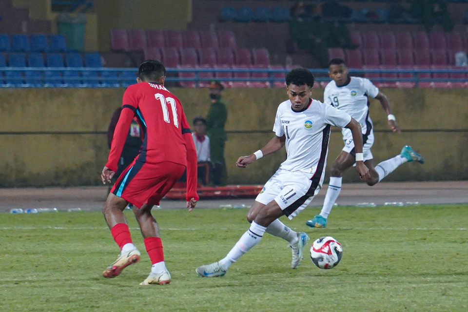 Chưa có điểm số nào sau hai lượt trận đầu tiên, các cầu thủ Timor Leste nhập cuộc với quyết tâm cao độ. (Ảnh: Việt Anh/Vietnam+)