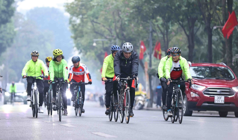 Khởi động một năm mới nhiều sức khỏe, bình an của những người yêu thể thao. (Ảnh: Minh Đức/TTXVN)