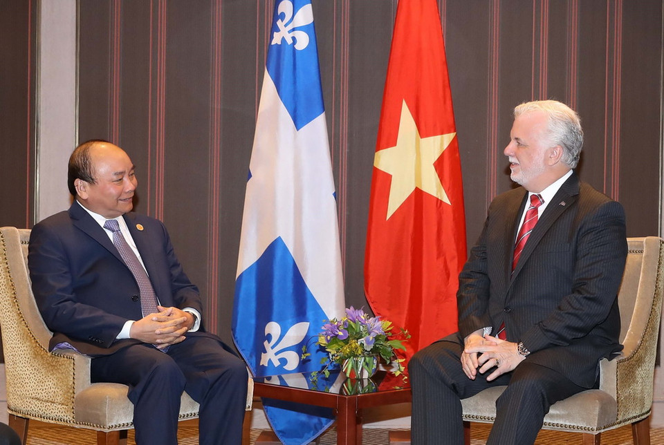  Thủ tướng Nguyễn Xuân Phúc gặp Thủ hiến bang Quebec Philippe Couillard. (Ảnh: Thống Nhất/TTXVN)