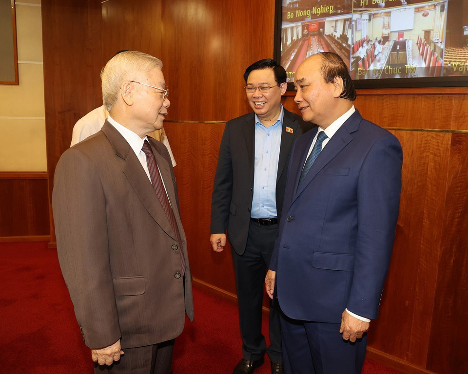  Tổng Bí thư Nguyễn Phú Trọng, Chủ tịch nước Nguyễn Xuân Phúc, Chủ tịch Quốc hội Vương Đình Huệ dự hội nghị. (Ảnh: Trí Dũng/TTXVN)