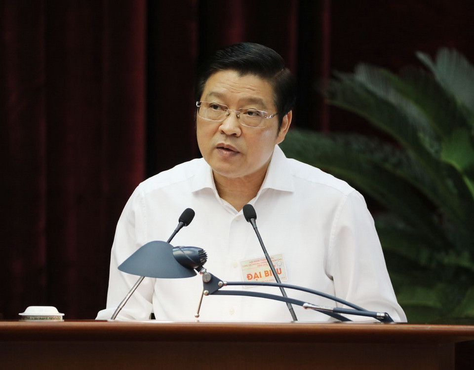 Ông Phan Đình Trạc, Bí thư Trung ương Đảng, Phó Trưởng Ban Thường trực Ban Chỉ đạo Trung ương về phòng, chống tham nhũng, Trưởng Ban Nội chính Trung ương trình bày Báo cáo tóm tắt tình hình, kết quả công tác phòng, chống tham nhũng từ đầu nhiệm kỳ Đại hội XII của Đảng đến nay, phương hướng nhiệm vụ thời gian tới. (Ảnh: Phương Hoa/TTXVN)