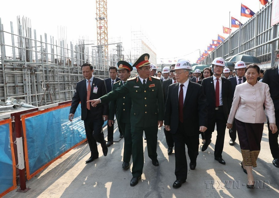 Tổng Bí thư, Chủ tịch nước Nguyễn Phú Trọng đến thăm dự án xây dựng Nhà Quốc hội Lào. Đây là công trình có ý nghĩa về chính trị-đối ngoại, biểu tượng sâu đậm của mối quan hệ hữu nghị vĩ đại, đoàn kết đặc biệt và hợp tác toàn diện Việt Nam-Lào (2019). (Ảnh: Trí Dũng/TTXVN)