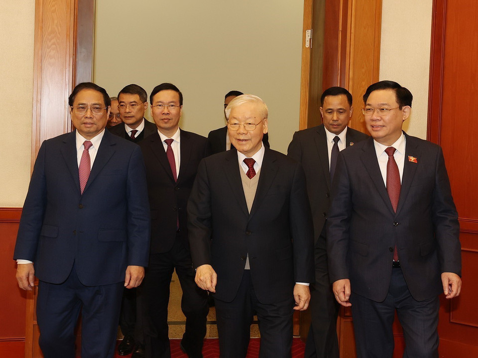 Tổng Bí thư Nguyễn Phú Trọng cùng các lãnh đạo Đảng, Nhà nước dự chúc Tết. (Ảnh: Trí Dũng/TTXVN)