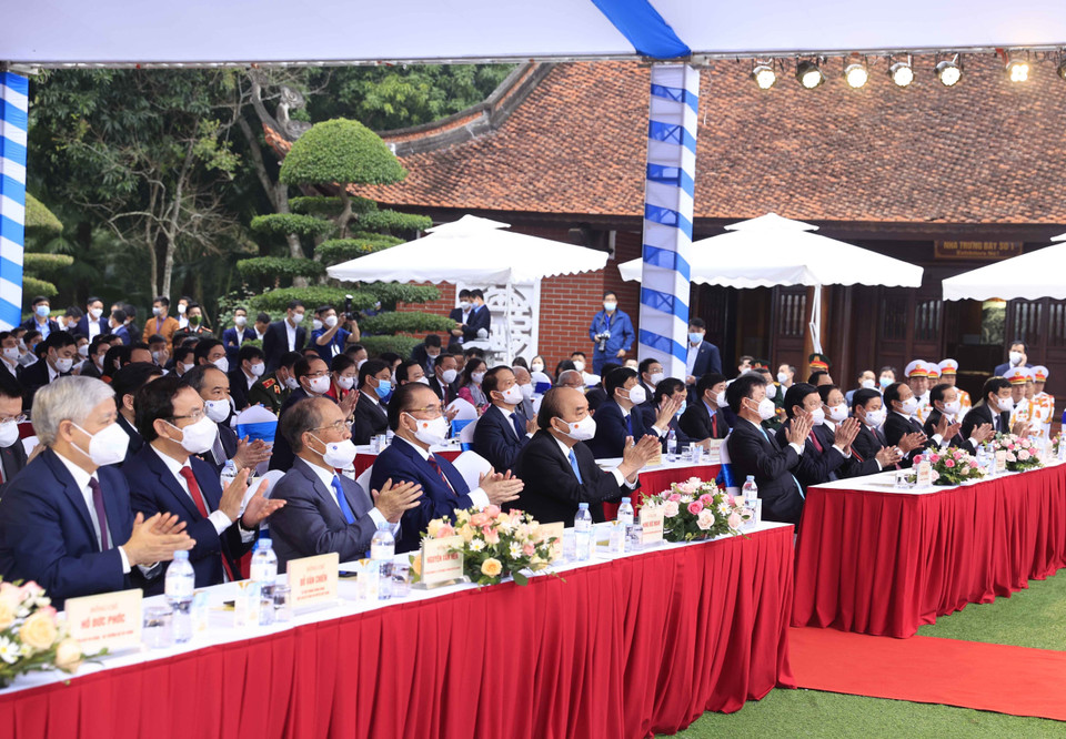 Chủ tịch nước Nguyễn Xuân Phúc, các lãnh đạo, nguyên Đảng, Nhà nước dự Lễ kỷ niệm. (Ảnh: Thống Nhất/TTXVN)