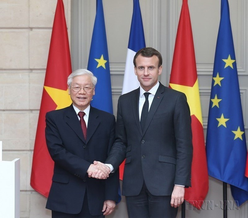 Tổng Bí thư Nguyễn Phú Trọng gặp Tổng thống Emmanuel Macron, chiều 27/3/2018 tại Phủ Tổng thống ở Thủ đô Paris trong chuyến thăm chính thức Cộng hòa Pháp từ 25-27/3/2018. (Ảnh: Trí Dũng/TTXVN)