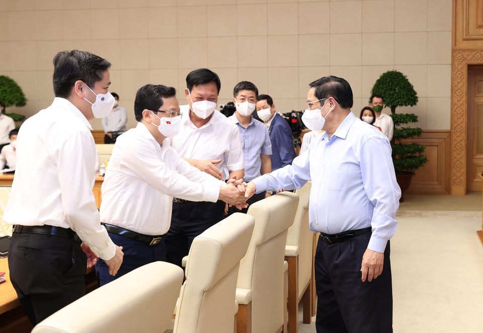 Thủ tướng Phạm Minh Chính với các đại biểu. (Ảnh: Dương Giang/TTXVN)