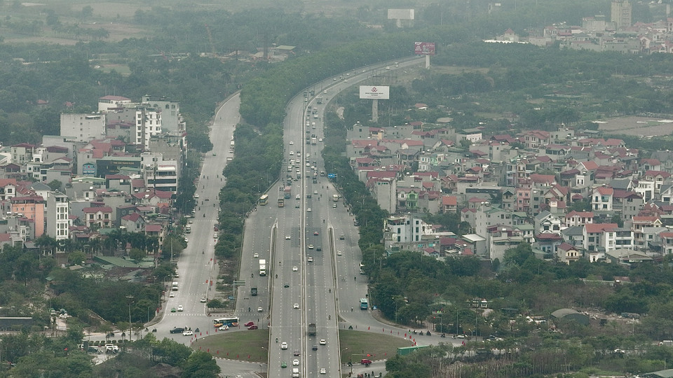 Đường Phạm Văn Đồng vào thời điểm 14 giờ. (Ảnh: Minh Sơn/Vietnam+)