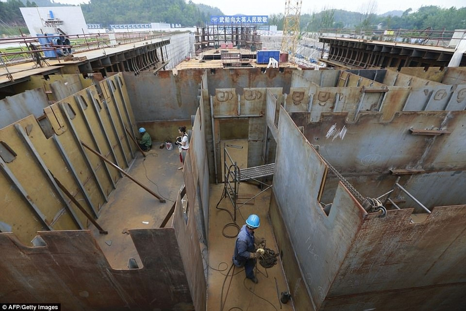 Phiên bản tàu Titanic Trung Quốc sẽ được đặt trên sông sát Khu nghỉ dưỡng Du lịch Văn hóa Quốc tế Romandisea Seven Star, thành phố Toại Ninh, Tứ Xuyên.(Nguồn: AFP/GettyImages)