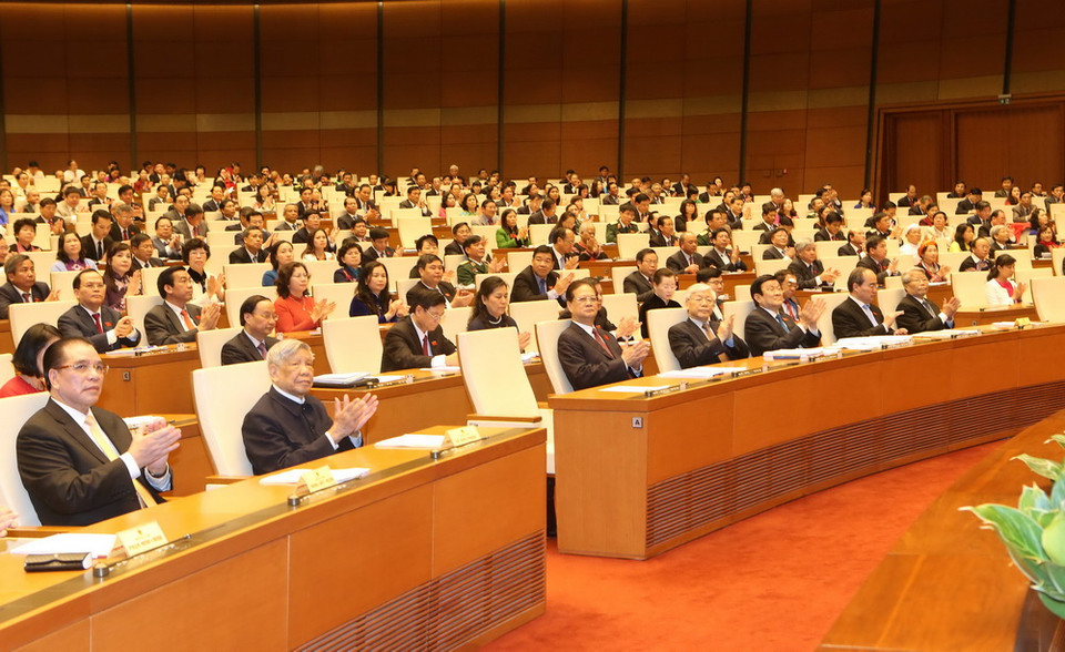 Các lãnh đạo, nguyên lãnh đạo Đảng và Nhà Nhà nước và các đại biểu tại phiên khai mạc. (Ảnh: Nhan Sáng/TTXVN)