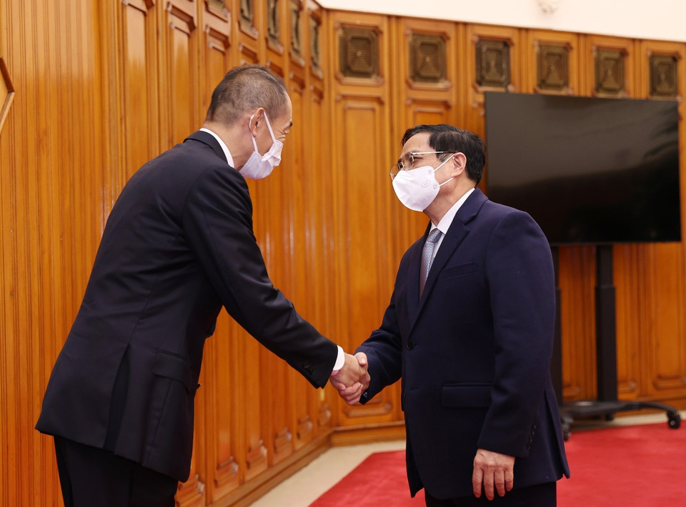 Thủ tướng Phạm Minh Chính tiếp Giám đốc WHO khu vực Tây Thái Bình Dương Takeshi Kasai. (Ảnh: Dương Giang/TTXVN)