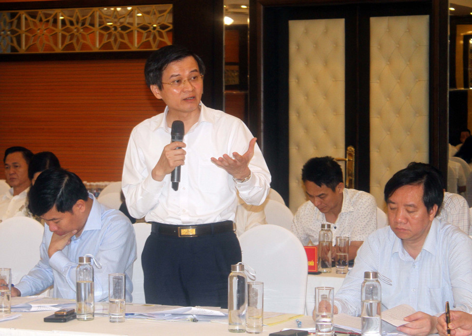 Ông Đoàn Minh Huấn, Ủy viên Trung ương Đảng, Ủy viên Ban Chấp hành Đảng bộ Khối các cơ quan Trung ương, Tổng Biên tập Tạp chí Cộng sản phát biểu tại hội nghị. (Ảnh: Tá Chuyên/TTXVN)