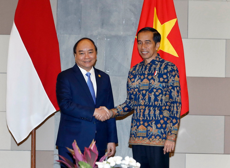 Thủ tướng Nguyễn Xuân Phúc hội đàm với Tổng thống Cộng hòa Indonesia Joko Widodo. (Ảnh: Thống Nhất/TTXVN)