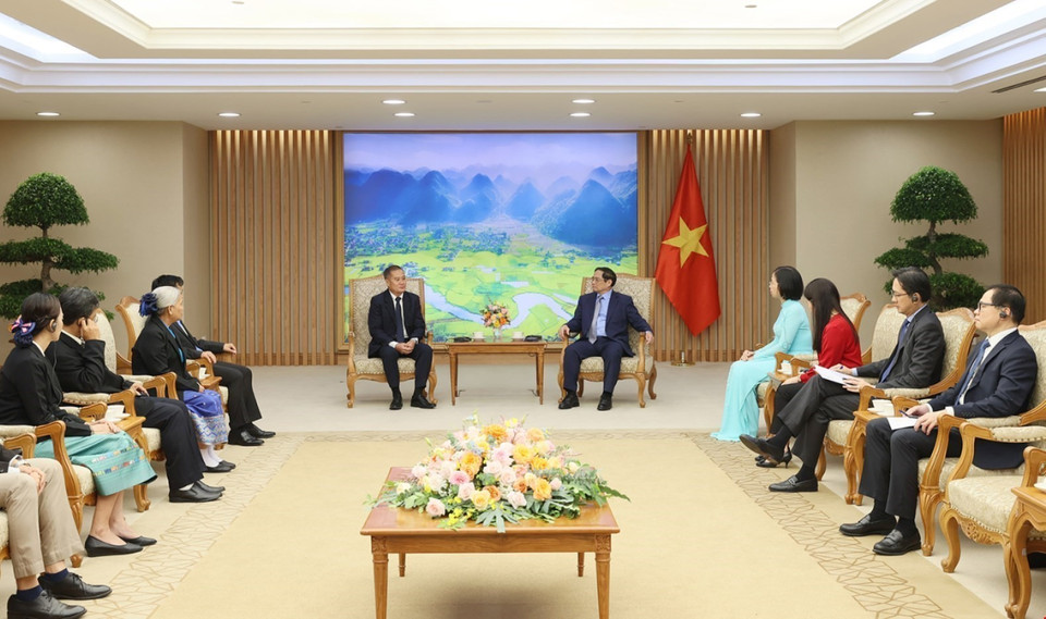 Thủ tướng Phạm Minh Chính tiếp Tổng Giám đốc Thông tấn xã Pathet Lào (KPL) Khampheuy Philapha đang thăm và làm việc tại Việt Nam. (Ảnh: Dương Giang/TTXVN)