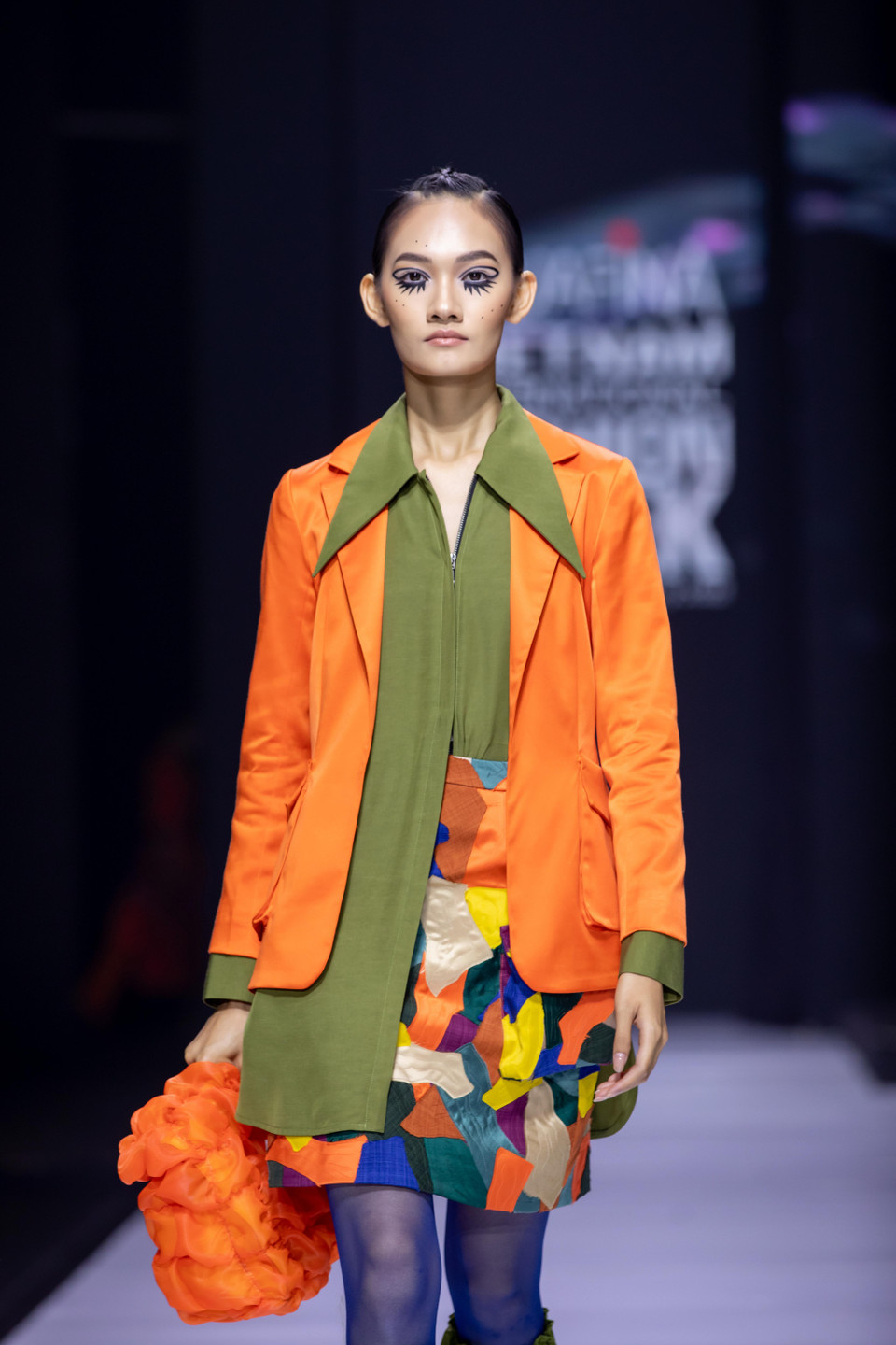 Thương hiệu Tiny Ink by Hoàng Quyên luôn để lại dấu ấn trong mỗi lần ra mắt bộ sưu tập mới bằng lối tư duy thiết kế kết hợp hài hòa giữa thời trang với hội họa. (Ảnh: CTV/Vietnam+)