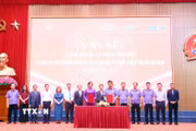 Lễ ký kết chương trình hợp tác truyền thông giữa Viện Kiểm sát Nhân dân Tối cao với Thông tấn xã Việt Nam. (Ảnh: Phạm Kiên/TTXVN)