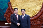 Chủ tịch nước Lương Cường hội đàm với Tổng Bí thư, Chủ tịch nước Lào Thongloun Sisoulith. (Ảnh: Lâm Khánh/TTXVN)