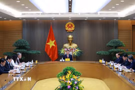 Thủ tướng Lê Minh Hưng điện đàm với Thủ tướng Đức Friedrich Merz. (Ảnh: Dương Giang/TTXVN)