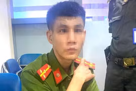 Đối tượng mặc quân phục công an giả xuất hiện tại Sân bay Đà Nẵng. (Ảnh do công an cung cấp)