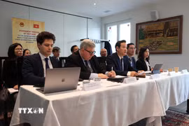 Các đại biểu tham dự hội thảo tại Phái đoàn thường trực Việt Nam tại Geneva. (Ảnh: Ngọc Ánh/TTXVN)