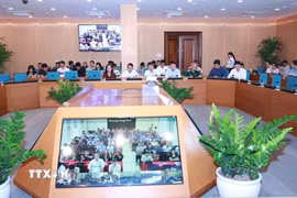 Hội nghị tiếp nhận, tổng hợp ý kiến và trả lời nhân dân về điều chỉnh tổng thể Quy hoạch phân khu đô thị sông Hồng. (Ảnh: Vũ Quang/TTXVN)